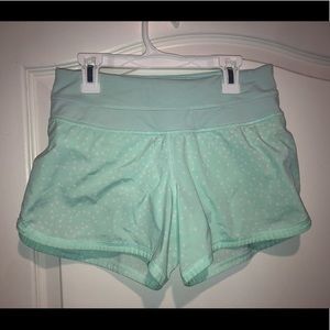 Light green Lululemon 4 inch shorts